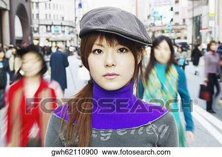 Portrait of a young woman at the market View Large Photo Image Stock Image - Portrait of a young woman at the market . Fotosearch