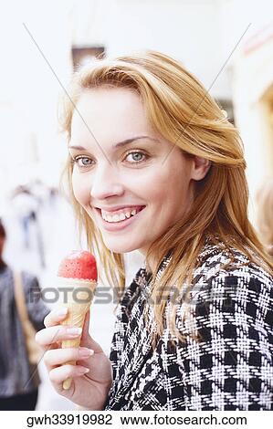 Portrait of a young woman smiling View Large Photo Image Stock Image - Portrait of a young woman smiling. Fotosearch