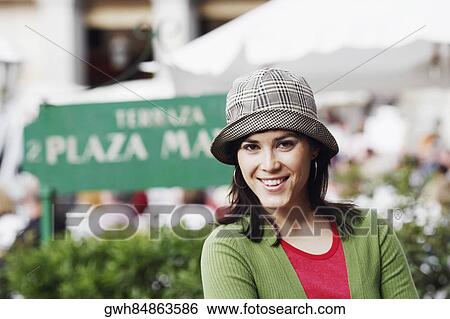 Portrait of a young woman smiling View Large Photo Image Stock Photograph - Portrait of a young woman smiling . Fotosearch
