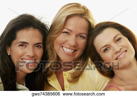 Portrait of two mid adult women and a mature woman smiling View Large Photo Image Stock Photograph - Portrait of two mid adult women and a mature woman smiling. Fotosearch