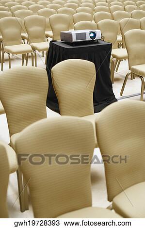 Stock Image - Projection equipment in an auditorium. Fotosearch