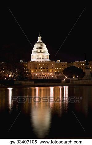Reflection of a government building in water, Capitol building, Washington DC, USA View Large Photo Image Stock Photography - Reflection of a government building in water, Capitol building, Washington DC, USA. Fotosearch