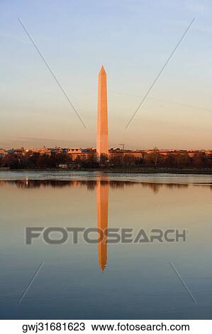 Reflection of a monument in water, Washington Monument, Washington DC, USA View Large Photo Image Stock Image - Reflection of a monument in water, Washington Monument, Washington DC, USA. Fotosearch