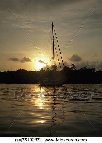 Sailboat in the sea View Large Photo Image Stock Image - Sailboat in the sea. Fotosearch