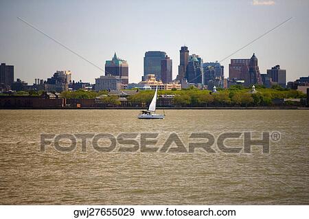 Sailboat in water, Manhattan, New York City, New York State, USA View Large Photo Image Stock Photo - Sailboat in water, Manhattan, New York City, New York State, USA. Fotosearch