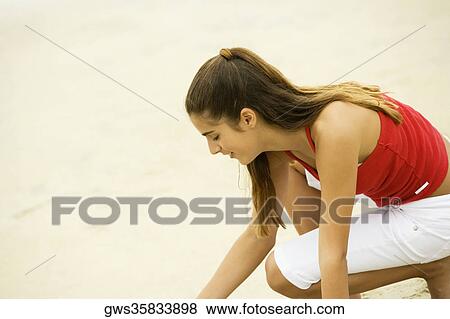 Side profile of a girl smiling View Large Photo Image Stock Photo - Side profile of a girl smiling. Fotosearch