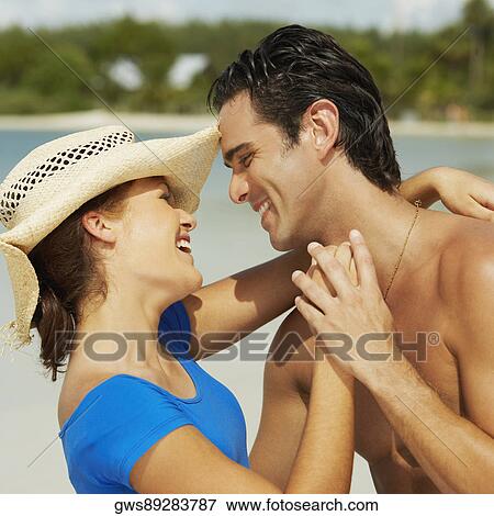 Side profile of a young man and a teenage girl dancing View Large Photo Image Stock Photo - Side profile of a young man and a teenage girl dancing. Fotosearch