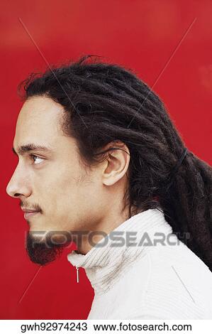 Side profile of a young man with dreadlocks View Large Photo Image Stock Image - Side profile of a young man with dreadlocks. Fotosearch