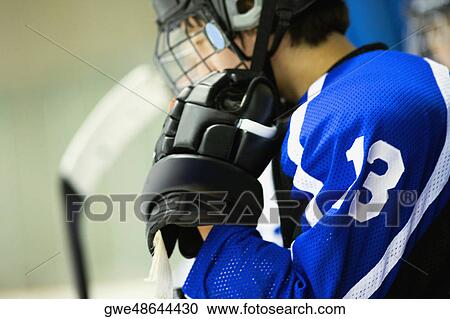 Side profile of an ice hockey player View Large Photo Image Stock Image - Side profile of an ice hockey player. Fotosearch