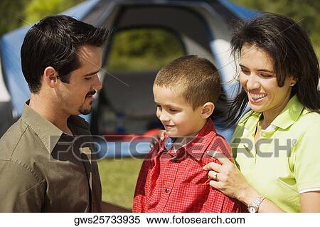 Side profile of parents and their son View Large Photo Image Stock Photography - Side profile of parents and their son. Fotosearch