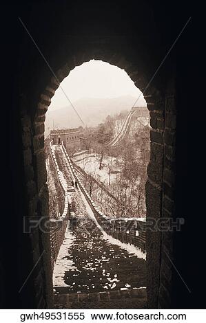 Stock Photography - Stoned wall seen through and arch of a window, Great Wall Of China, China. Fotosearch
