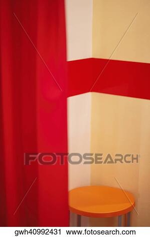 Stock Image - Stool in a corner. Fotosearch