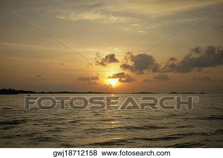 Sunset over the sea View Large Photo Image Stock Photo - Sunset over the sea. Fotosearch