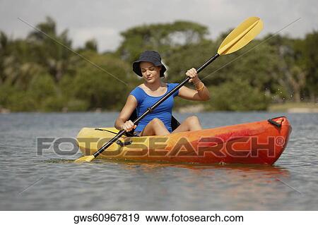 Teenage girl kayaking View Large Photo Image Stock Photo - Teenage girl kayaking. Fotosearch