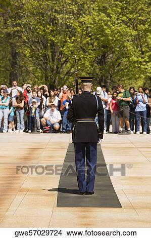Tourist looking at an honor guard View Large Photo Image Picture - Tourist looking at an honor guard. Fotosearch