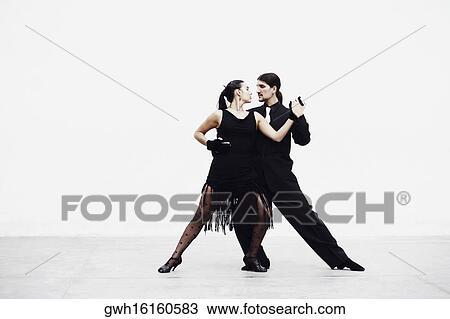Young couple tangoing View Large Photo Image Stock Image - Young couple tangoing. Fotosearch