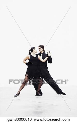 Young couple tangoing View Large Photo Image Stock Image - Young couple tangoing. Fotosearch