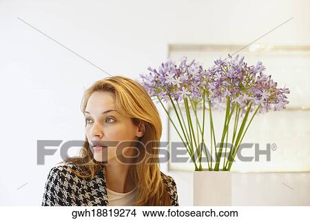 Young woman looking away View Large Photo Image Picture - Young woman looking away. Fotosearch