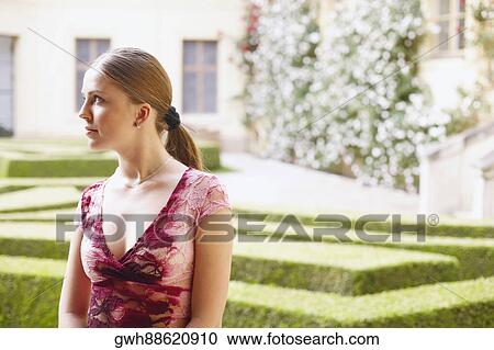 Young woman looking away View Large Photo Image Stock Image - Young woman looking away . Fotosearch