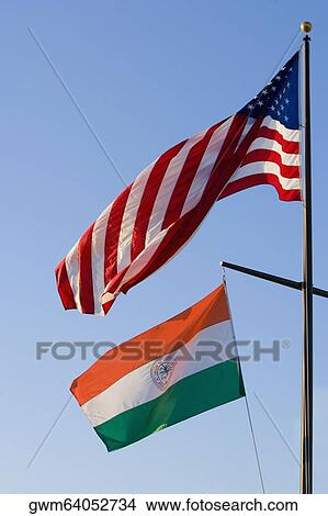 American flag and an Indian flag fluttering View Large Photo Image Picture - American flag and an Indian flag fluttering. Fotosearch
