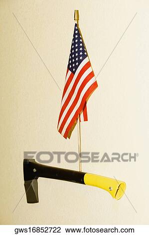 American flag on a stand mounted on a wall View Large Photo Image Stock Image - American flag on a stand mounted on a wall. Fotosearch