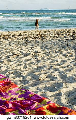 Stock Image - Beach towel on the beach. Fotosearch