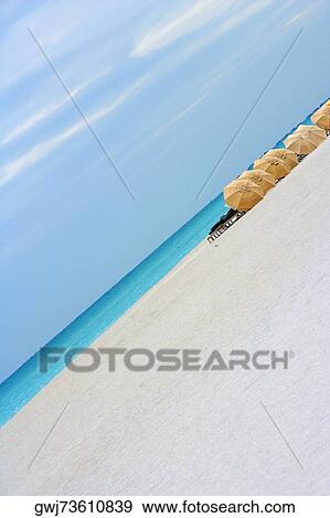 Beach umbrellas on the beach View Large Photo Image Stock Photo - Beach umbrellas on the beach. Fotosearch
