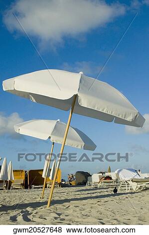 Beach umbrellas on the beach View Large Photo Image Stock Photo - Beach umbrellas on the beach. Fotosearch