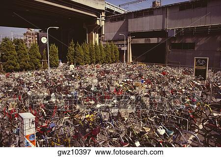Bicycles parked in a parking lot, Kyoto Prefecture, Japan View Large Photo Image Stock Photo - Bicycles parked in a parking lot, Kyoto Prefecture, Japan. Fotosearch
