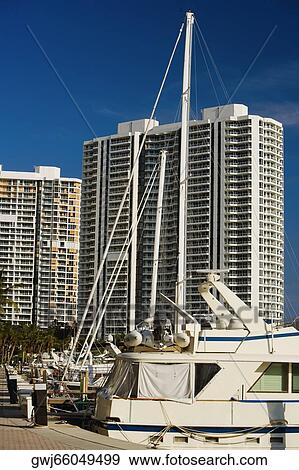 Boats docked at a harbor View Large Photo Image Stock Photo - Boats docked at a harbor. Fotosearch