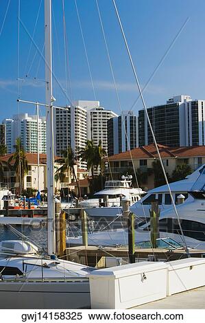 Boats docked at a harbor View Large Photo Image Stock Photography - Boats docked at a harbor. Fotosearch