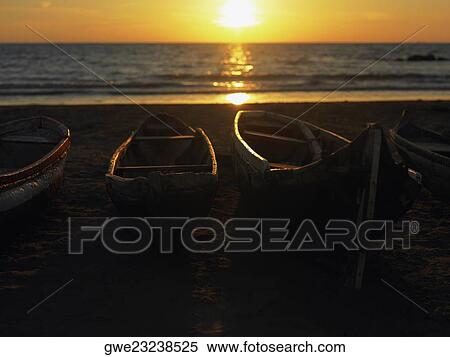 Stock Photography - Boats on the beach, Cartagena, Colombia. Fotosearch