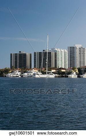 Buildings at the waterfront View Large Photo Image Stock Image - Buildings at the waterfront. Fotosearch