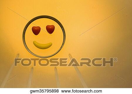 Stock Photo - Candy depicting a smiling face. Fotosearch