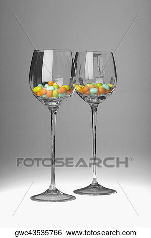 Candy in two stem glasses View Large Photo Image Stock Photograph - Candy in two stem glasses. Fotosearch