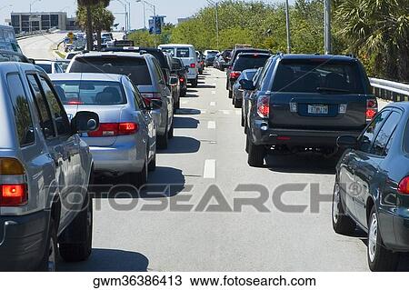 Cars moving on the road View Large Photo Image Stock Image - Cars moving on the road. Fotosearch