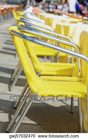 Chairs and tables at a sidewalk cafe, Venice, Veneto, Italy View Large Photo Image Stock Image - Chairs and tables at a sidewalk cafe, Venice, Veneto, Italy. Fotosearch