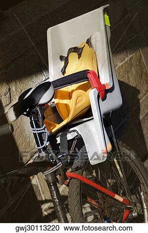 Close-up of a bicycle with chairs View Large Photo Image Stock Image - Close-up of a bicycle with chairs. Fotosearch