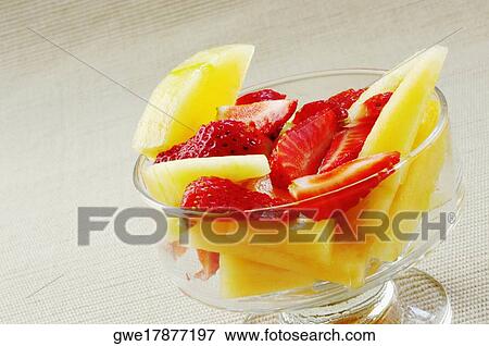 Close-up of a bowl of fruit salad View Large Photo Image Stock Photo - Close-up of a bowl of fruit salad. Fotosearch