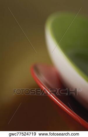 Close-up of a bowl on a plate View Large Photo Image Stock Photo - Close-up of a bowl on a plate. Fotosearch
