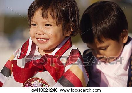 Close-up of a boy and his sister View Large Photo Image Stock Image - Close-up of a boy and his sister. Fotosearch