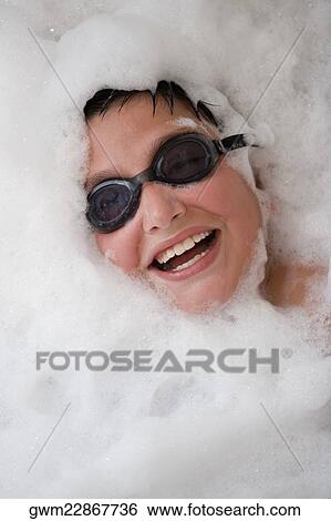 Close-up of a boy in a bubble bath View Large Photo Image Stock Photograph - Close-up of a boy in a bubble bath. Fotosearch
