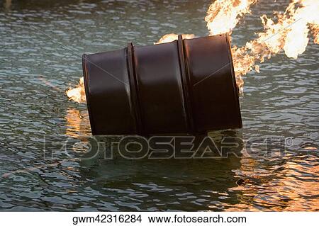 Close-up of a burning oil drum View Large Photo Image Picture - Close-up of a burning oil drum. Fotosearch