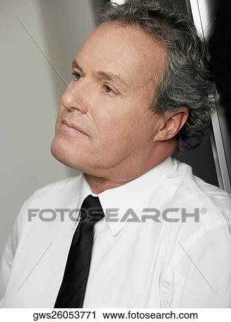 Close-up of a businessman looking stressed View Large Photo Image Stock Image - Close-up of a businessman looking stressed. Fotosearch