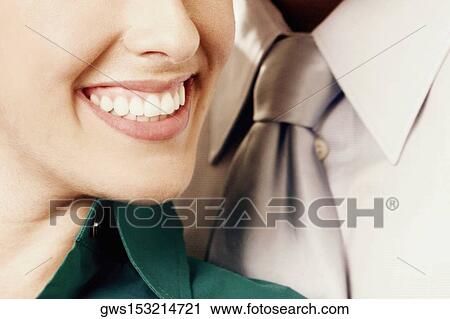 Close-up of a businesswoman smiling View Large Photo Image Stock Image - Close-up of a businesswoman smiling. Fotosearch