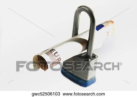 Close-up of a combination lock and Euro dollars View Large Photo Image Stock Image - Close-up of a combination lock and Euro dollars. Fotosearch