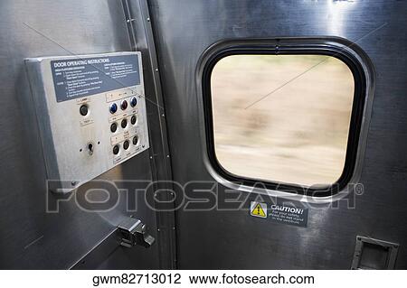 Close-up of a control panel near the exit door in a train View Large Photo Image Stock Image - Close-up of a control panel near the exit door in a train. Fotosearch
