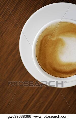 Close-up of a cup of coffee View Large Photo Image Stock Photograph - Close-up of a cup of coffee. Fotosearch