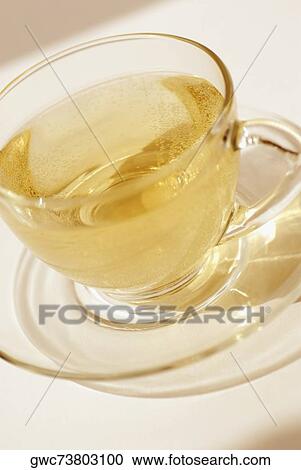 Stock Image - Close-up of a cup of herbal tea. Fotosearch