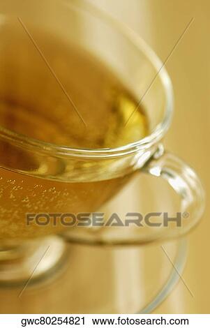 Close-up of a cup of herbal tea View Large Photo Image Stock Image - Close-up of a cup of herbal tea. Fotosearch